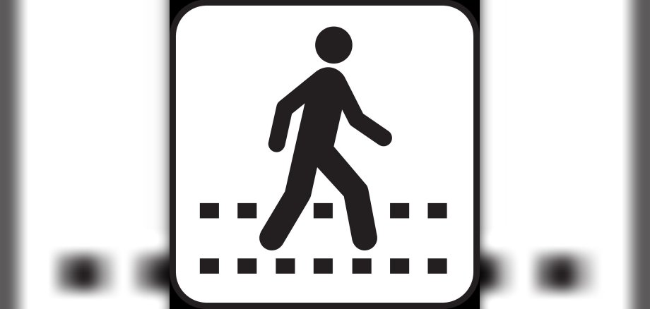 Verkehrszeichen für einen Fußgängerüberweg.