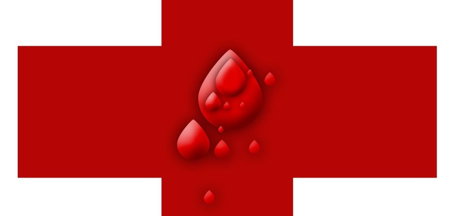 Ein rotes Kreuz, in dem Bluttropfen abgebildet sind.